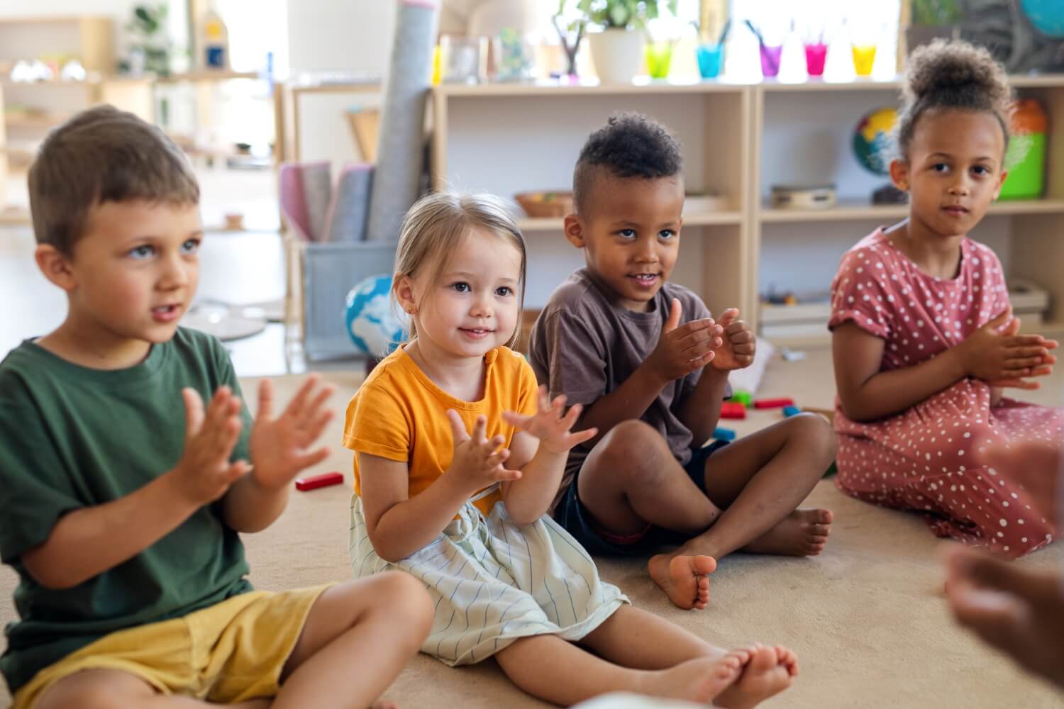 Preschool kids participating in a group activity at The Till Academy.